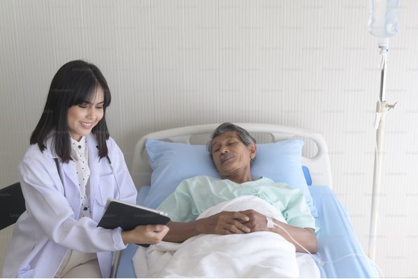 Senior inpatient discussion with clinician